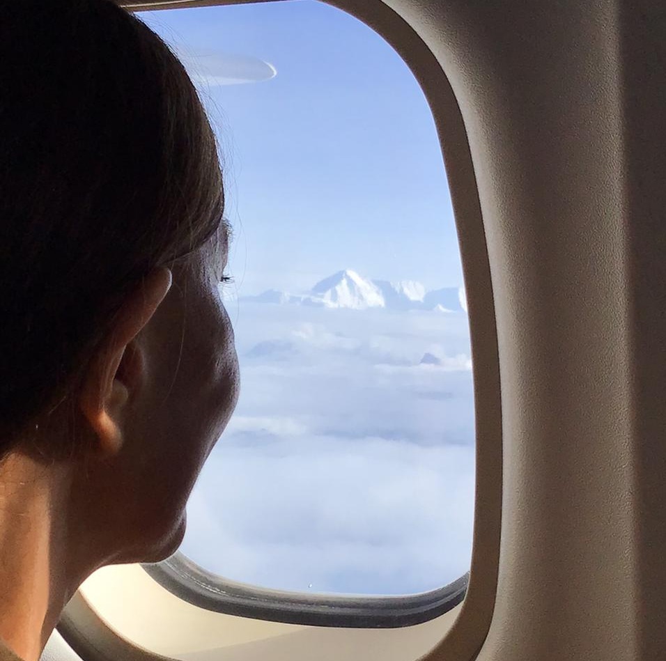 View of Mount Everest and Himalayas from airplane window