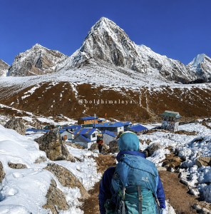 Snow-covered Gorak Shep village surrounded by the Himalayan mountains during winter on the Everest Base Camp Trek.