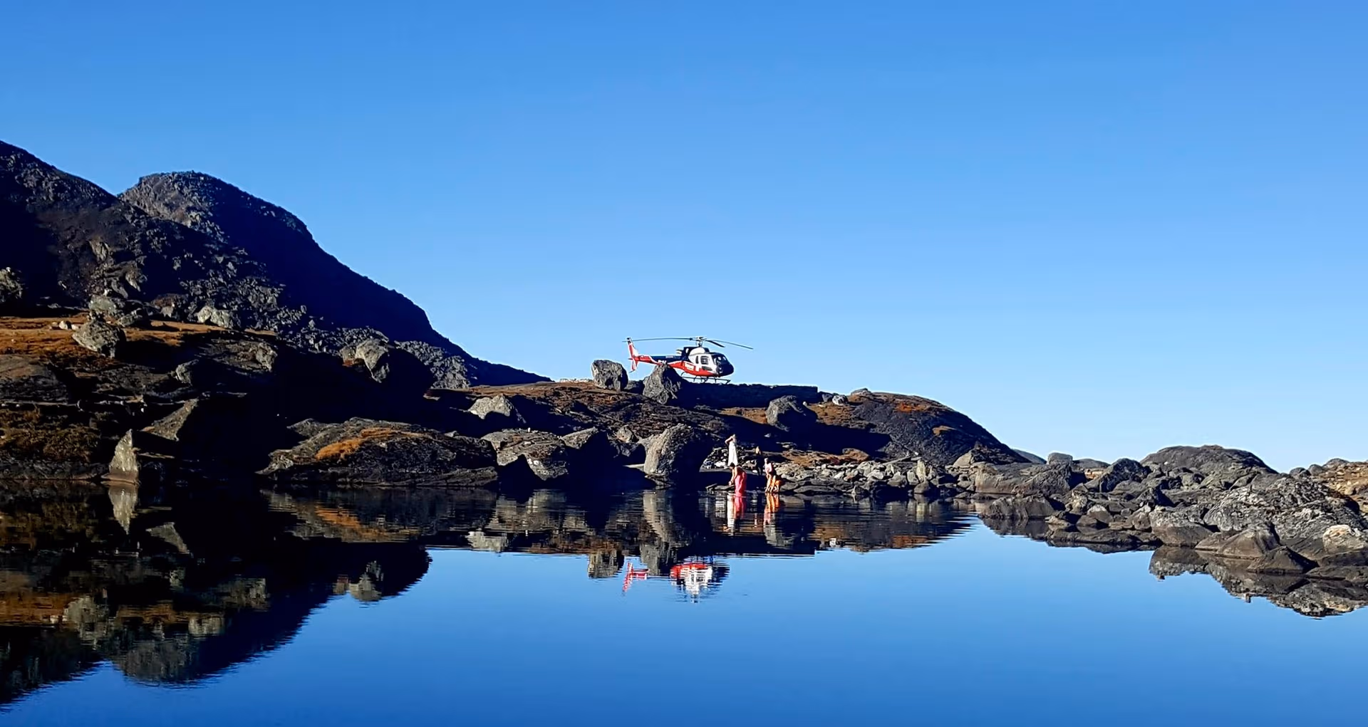 Experience the breathtaking beauty of Gosaikunda Lake on a Helicopter Tour from Kathmandu, flying over pristine mountains and sacred landscapes of the Langtang region