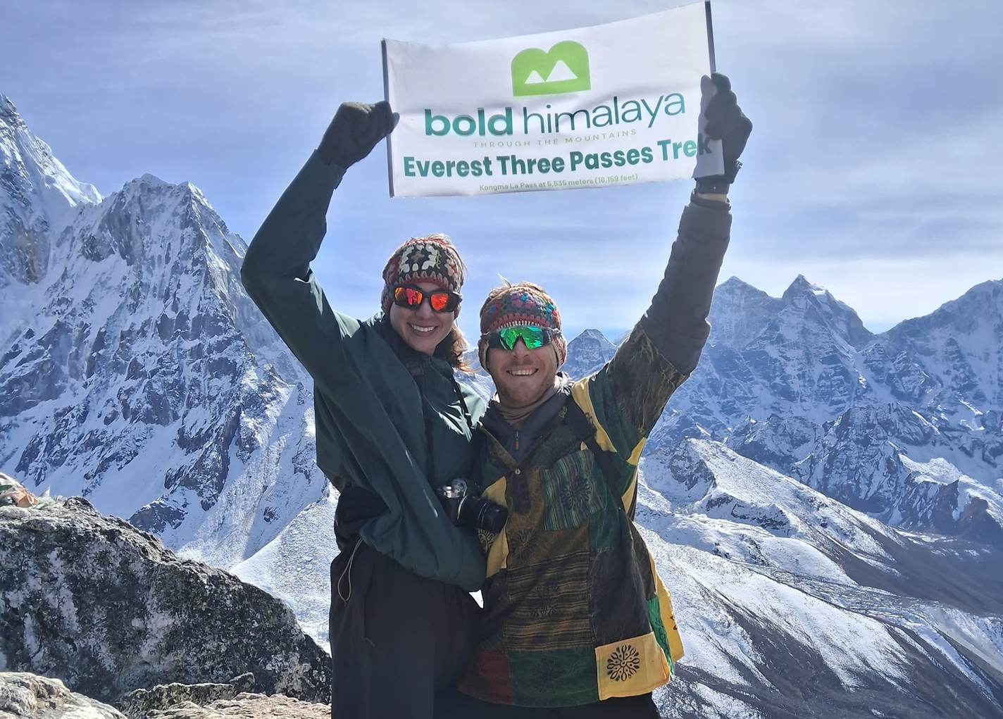 Happy trekkers on the trail enroute during the Everest Three Passes Trek and Everest Base Camp via Kongma La Pass in Nepal