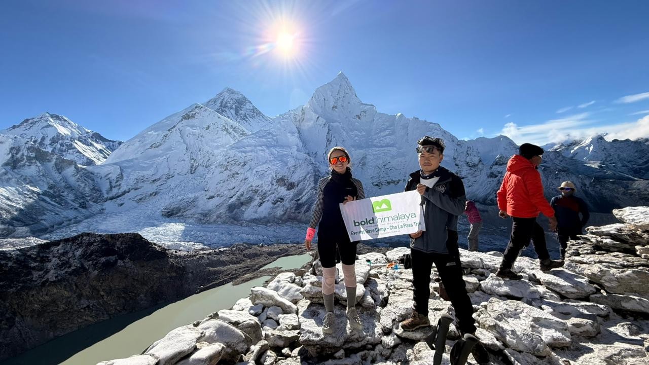 Trekkers at the summit of Kalapathar (5,545 m / 18,192 ft) during the Everest Base Camp Gokyo Cho La Pass Trek