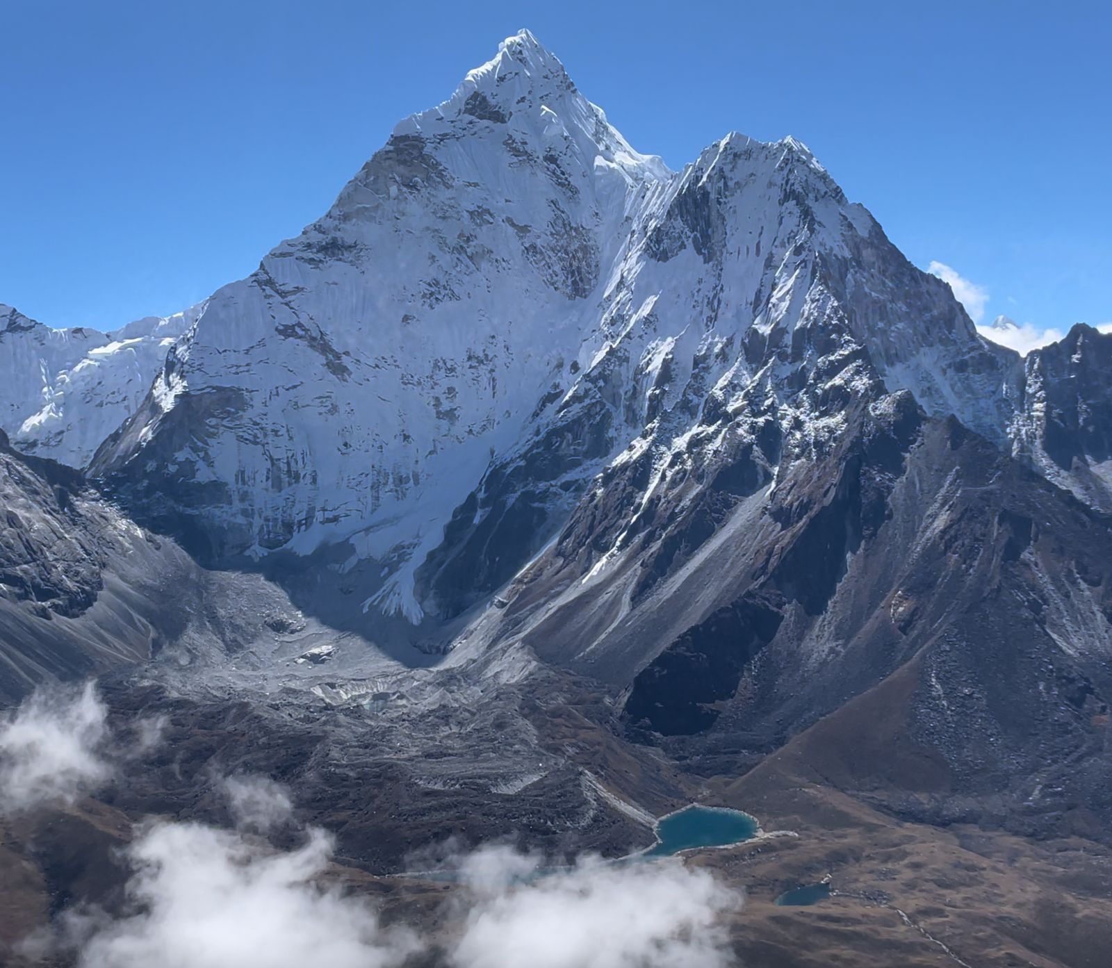 View of Mount Ama Dablam and Ben Glacier Lake from Nagarsang Peak (5,083 m / 16,680 ft) during the Everest Base Camp Trek with Helicopter Return