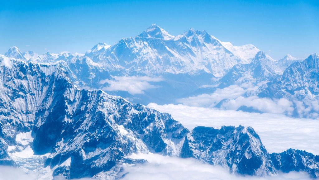 View of Mount Everest rising above the Himalayan range, representing the challenge and beauty of the 14 highest mountains in the world