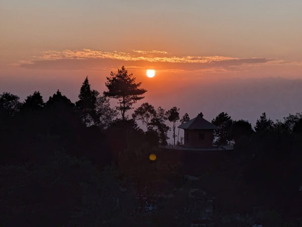 Sunset view over forested hills in Nagarkot during the Chisapani Nagarkot Dhulikhel Namobudhha trek