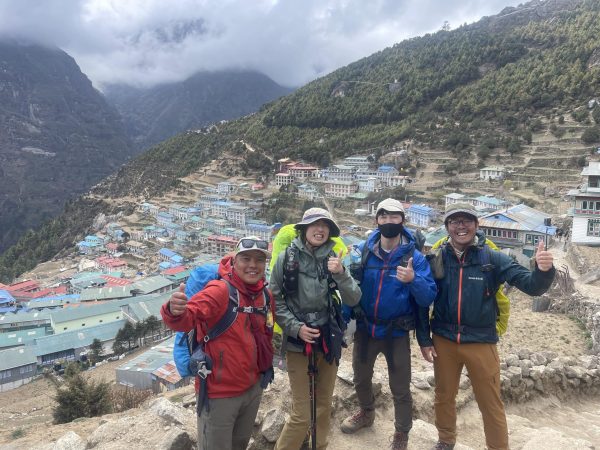 Trekkers capturing the moment above Namche Bazaar of Everest Base Camp Trek 13 days