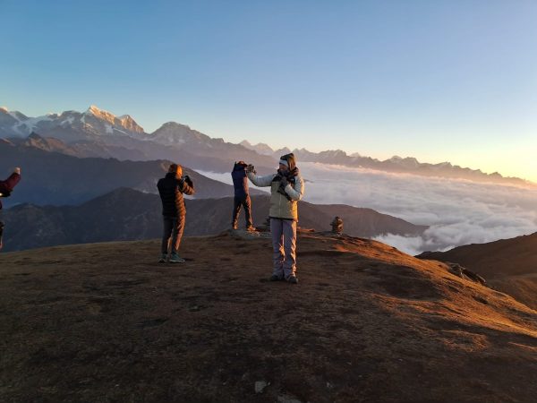 A breathtaking view from Pikey Peak (13,336 ft / 4,065 m), showcasing the stunning Himalayan range under a clear blue sky.