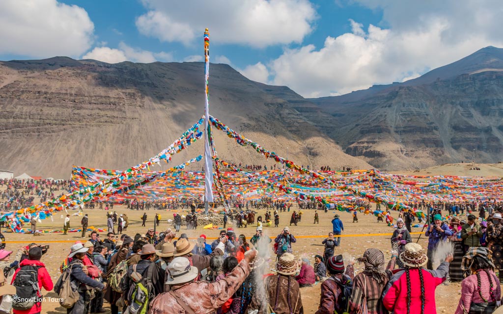 Pilgrims celebrating Saga Dawa Festival at Mount Kailash with prayer flags, rituals, and sacred kora during Mount Kailash Inner Kora Tour