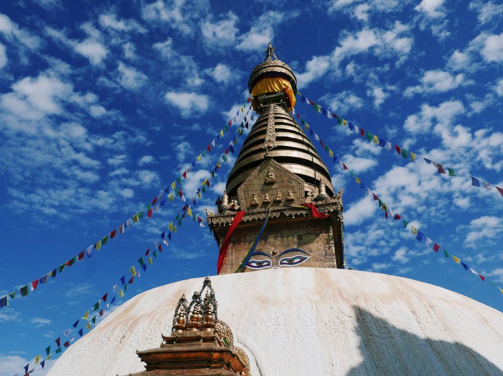 The Ancient Swayambhunath Stupa (Monkey Temple), one of the most sacred Buddhist sites and a fun things to do in Nepal