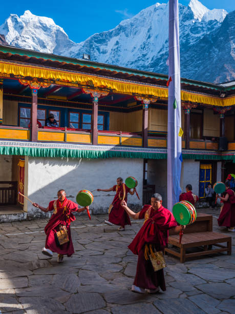 Monks performing traditional dance at Tengboche Monastery on the Everest Base Camp Trek with Kongma La Pass in the Khumbu region of Nepal.