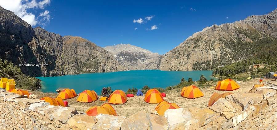 Tented camps on the bank of Shey Phoksundo Lake during the trek