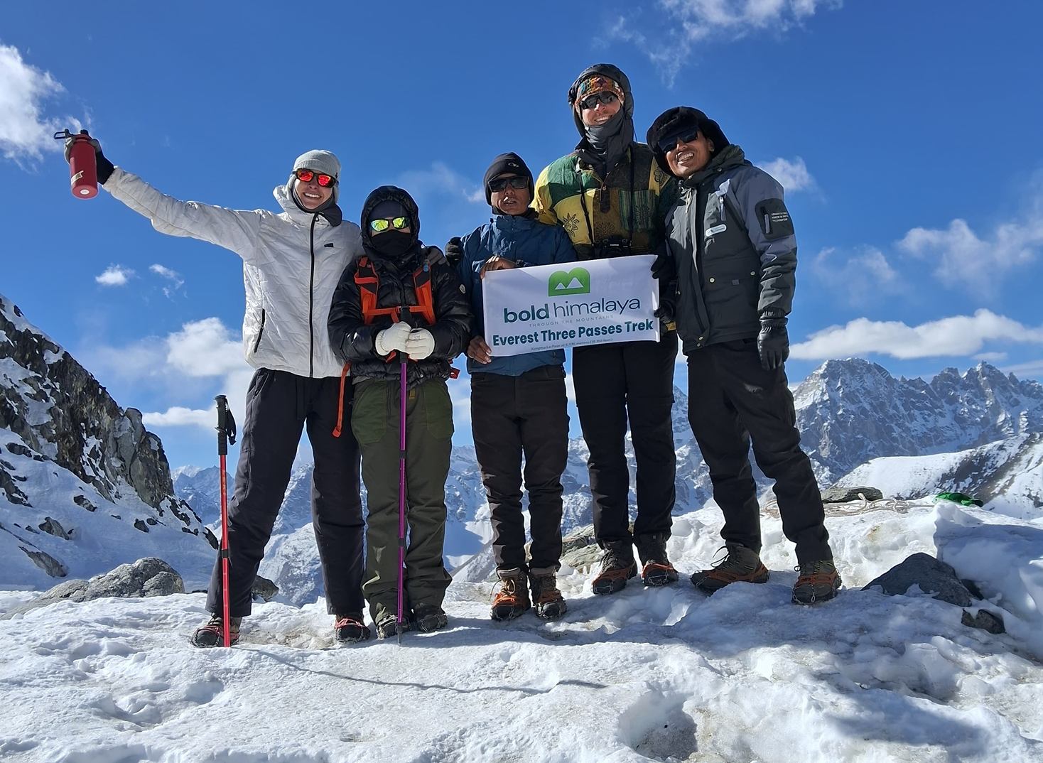Trekkers at Cho La Pass top during Everest Three Passes Trek and Everest Base Camp via Kongma La Pass in Nepal Himalayas