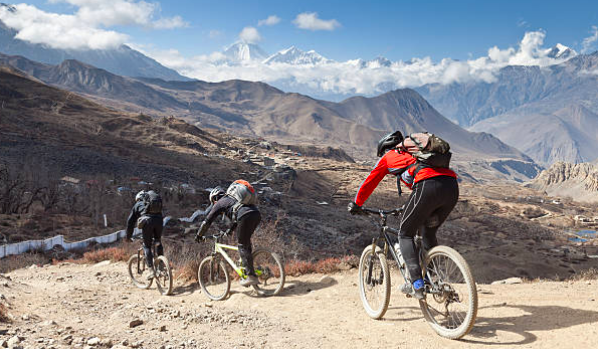 One of the fun things to do in Nepal is Mountain biking, an adventure on rugged Himalayan trails with scenic views of the Himalayas