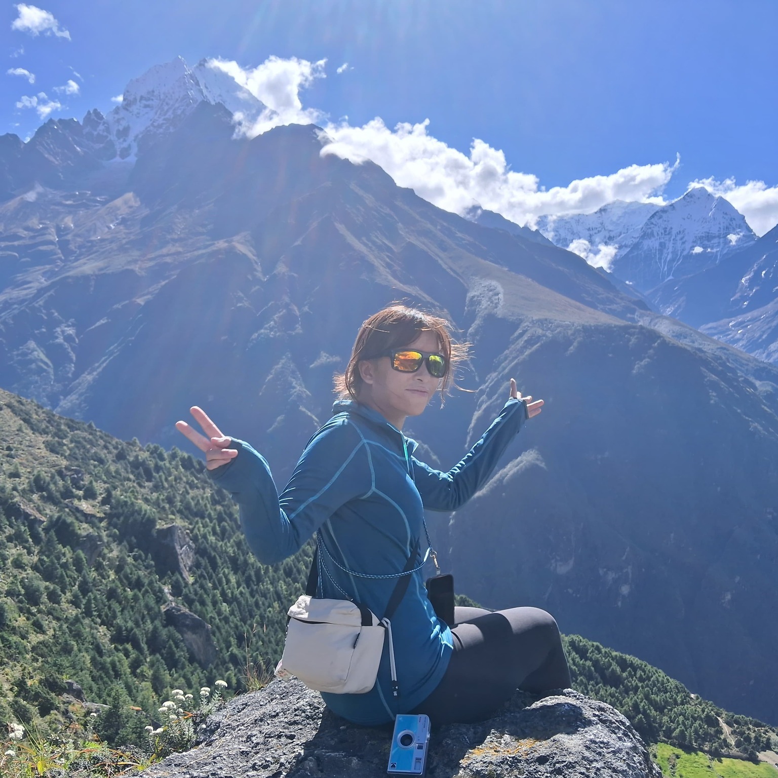 Trekkers enjoy breathtaking Himalayan views during the 12 Days Everest Base Camp Trek, from the vibrant Sherpa hub of Namche Bazaar to the majestic peaks surrounding Everest