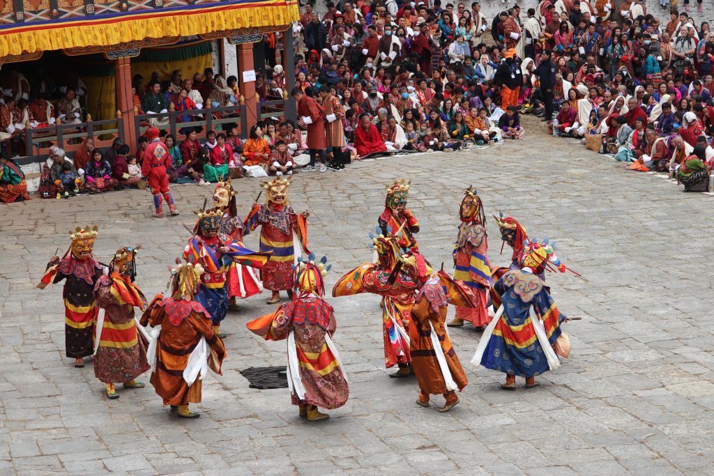 See the Traditional Bhutanese festival mask dance performance, one of the cultural things to do in Bhutan