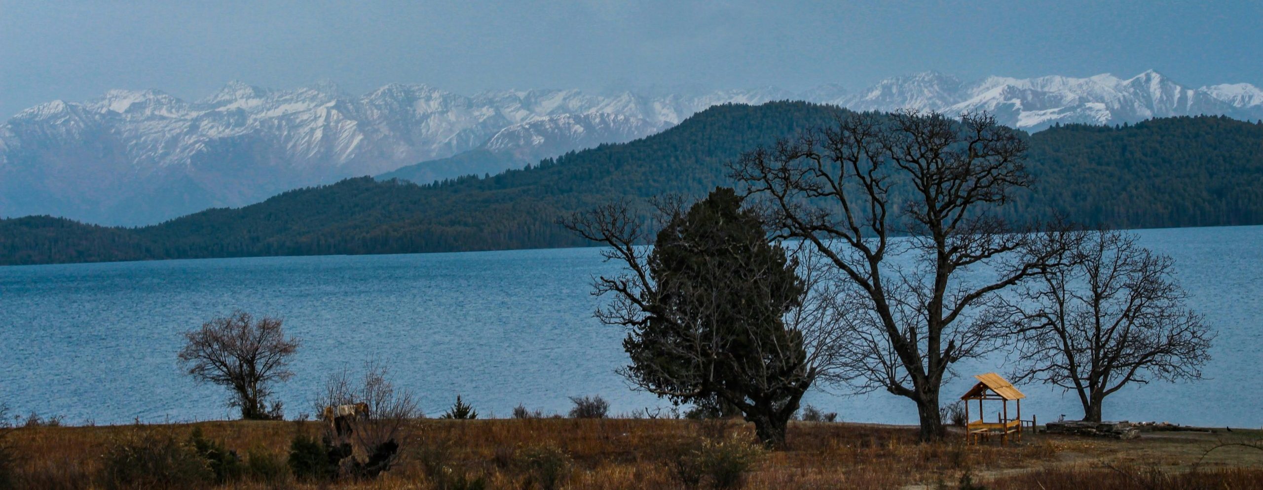 Crystal clear alpine lake during treks to beautiful lakes in Nepal