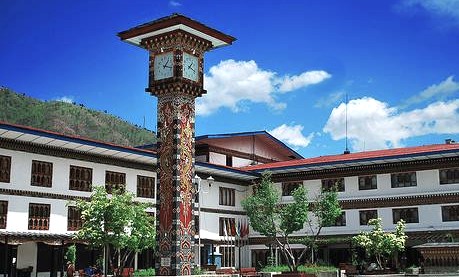 Clock Tower Square, surrounded by historic buildings, with a prominent clock tower at the center, places to visit in Bhutan