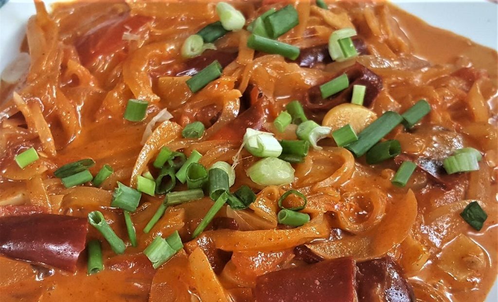 Ema Datshi, a traditional Bhutanese chili cheese dish, must-try food and one of the things to do in Bhutan