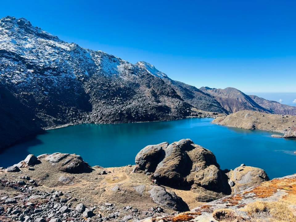 Scenic view of the sacred Gosaikunda Lake in Nepal, captured during a Helicopter Tour from Kathmandu, surrounded by pristine Himalayan landscapes