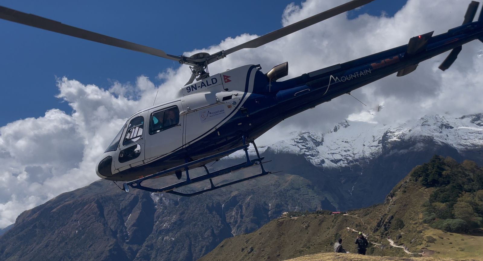Helicopter flying in the sky during a Helicopter Tours from Kathmandu with panoramic Himalayan views