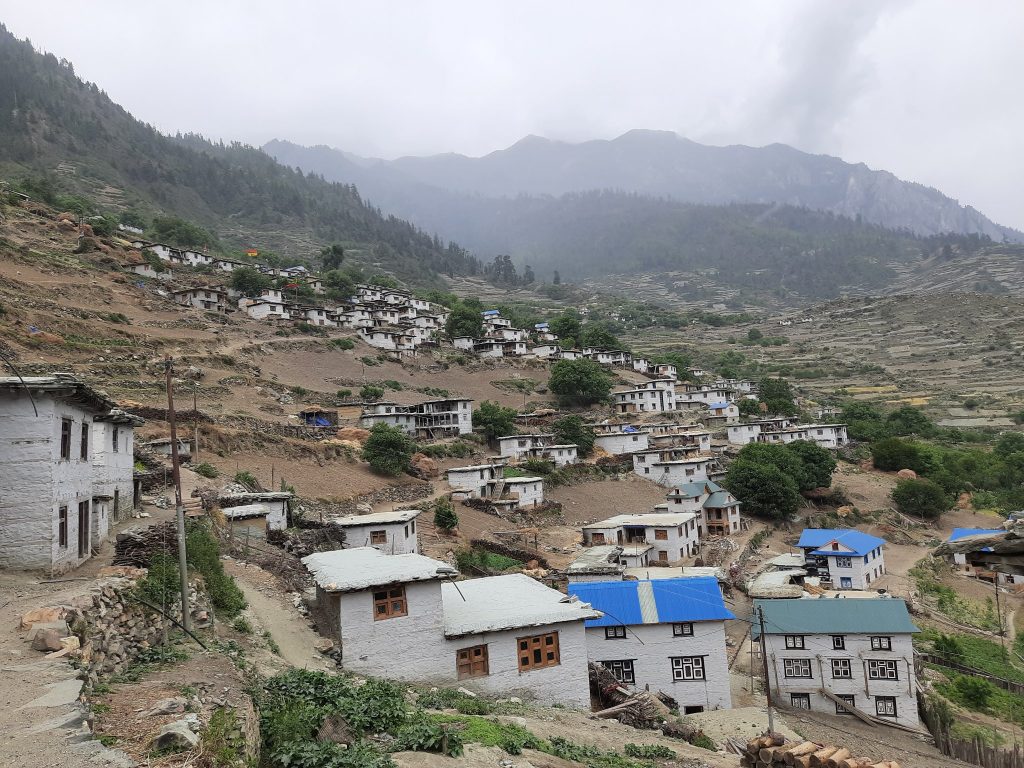 Lower Dolpo village in Nepal with traditional Tibetan houses and snow-capped Himalayan mountains – a best trek in Nepal destination