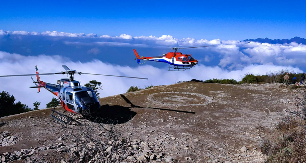 Helicopter landing near Pathibhara Temple during a scenic Helicopter Tour from Kathmandu, offering close-up views of the eastern Himalayan peaks