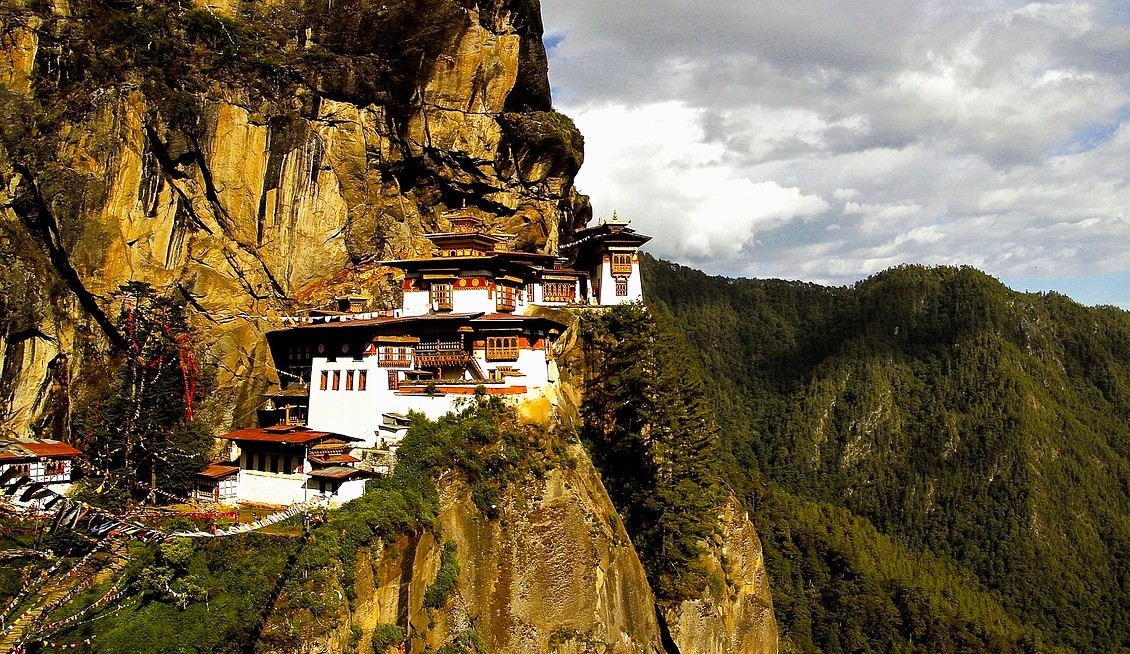 Best places to visit in Bhutan, Paro Taktsang (Tiger’s Nest Monastery), perched dramatically on a cliff above Paro Valley