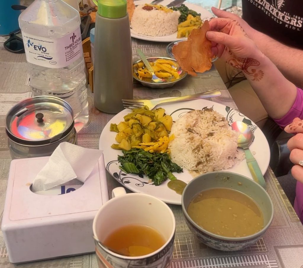 Simple tea house meal (dal bhat, soup, and tea) served to trekkers on the Everest Base Camp Trek