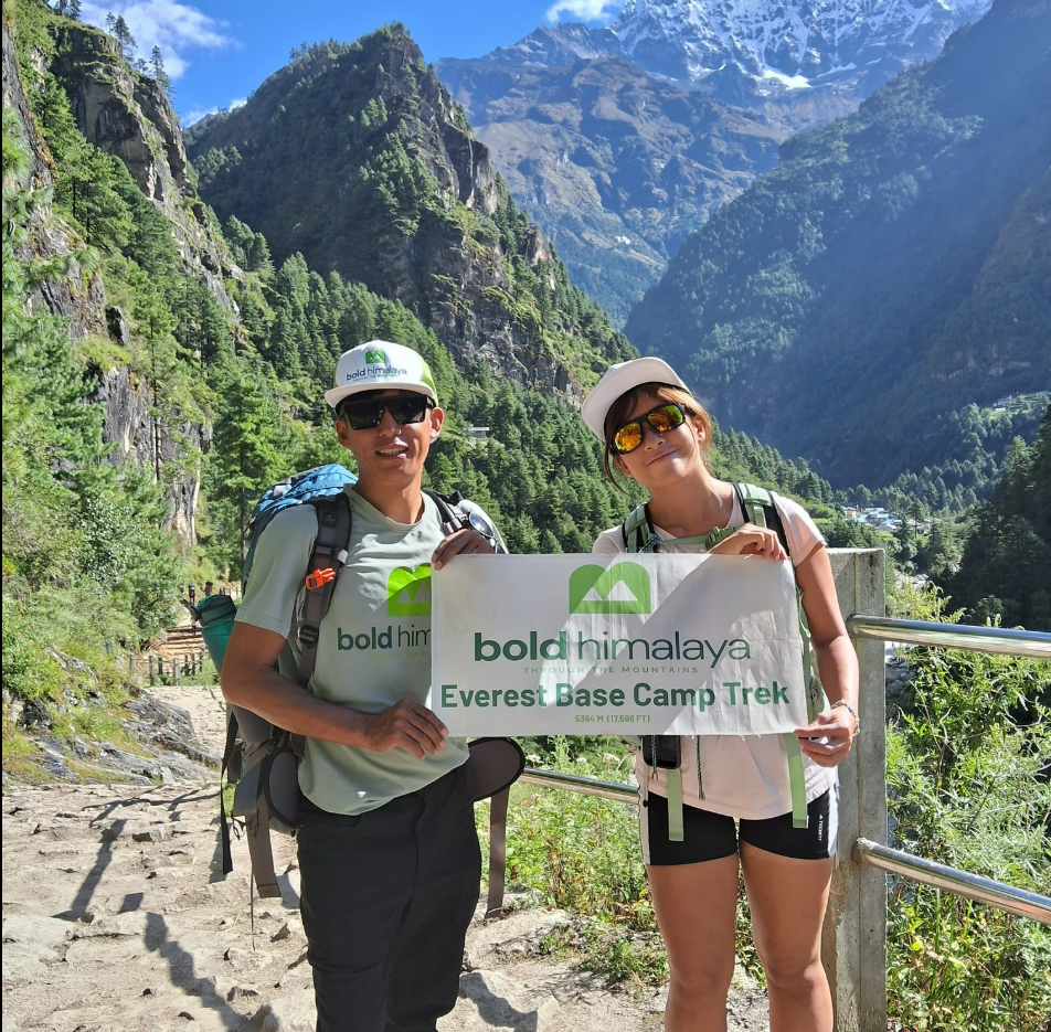 Trekkers enjoying the scenic trail of the Everest Base Camp Trek by Road with Bold Himalaya.