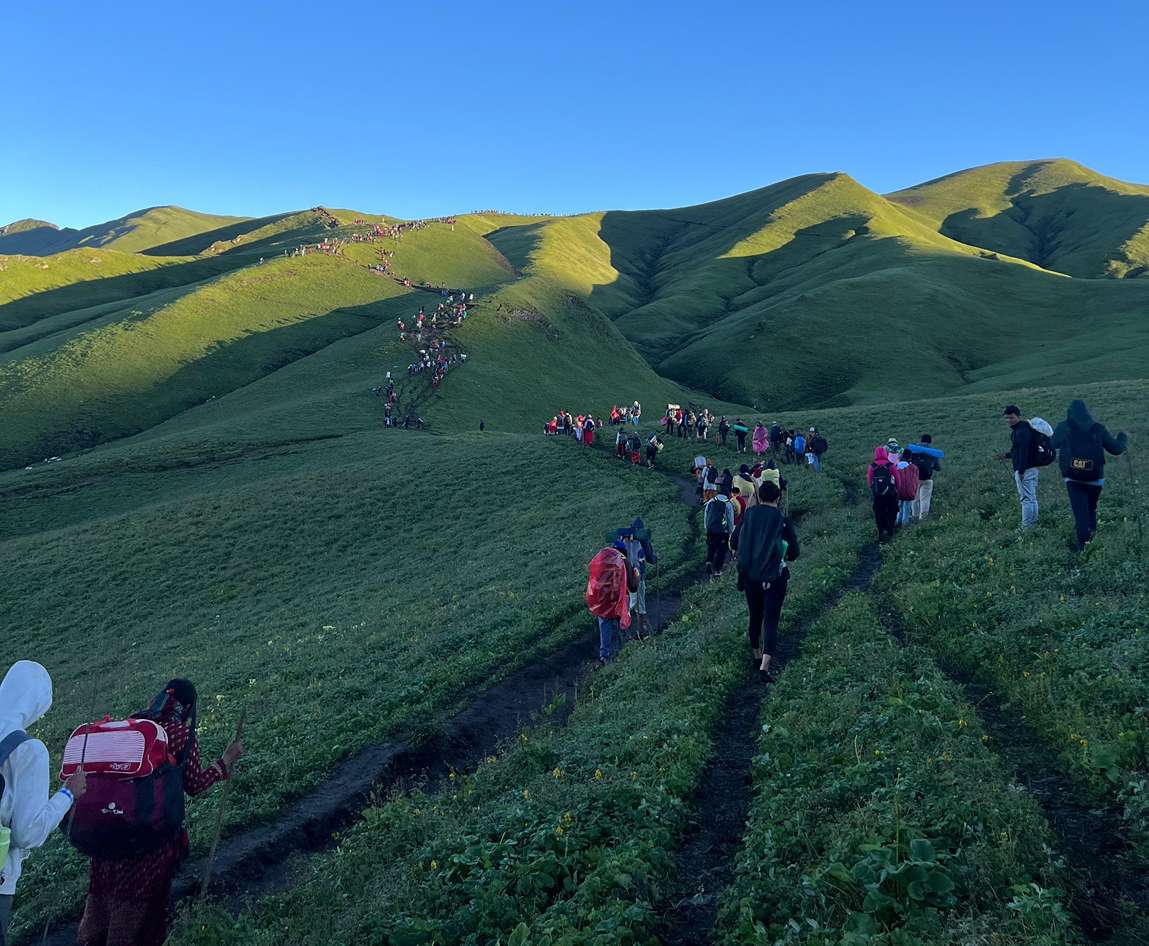 Hikers and pilgrims heading to Badimalika Temple through Triveni, Patan in Bajura, Nepal