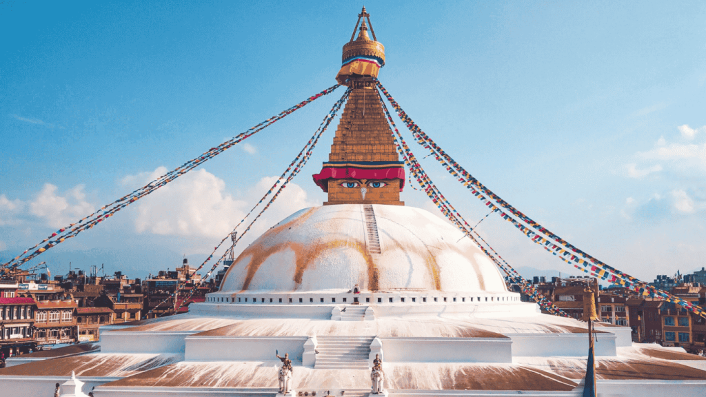 Boudhanath Stupa with prayer flags and Buddha eyes one of the largest stupas in Kathmandu Nepal