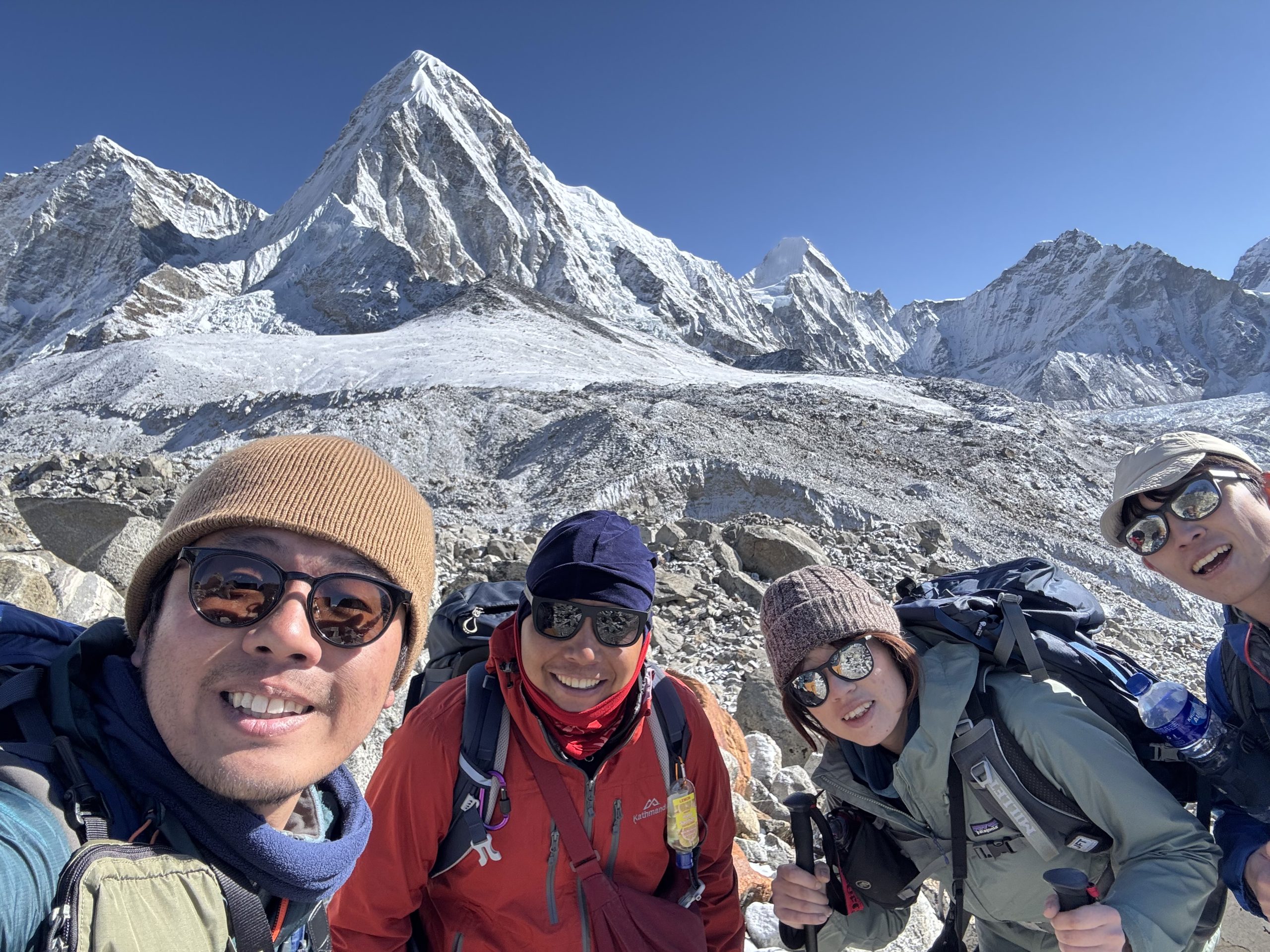 Smiling Trekkers on Challenging Everest Three Pass Trek during Gokyo Lakes Renjo La Pass Trek