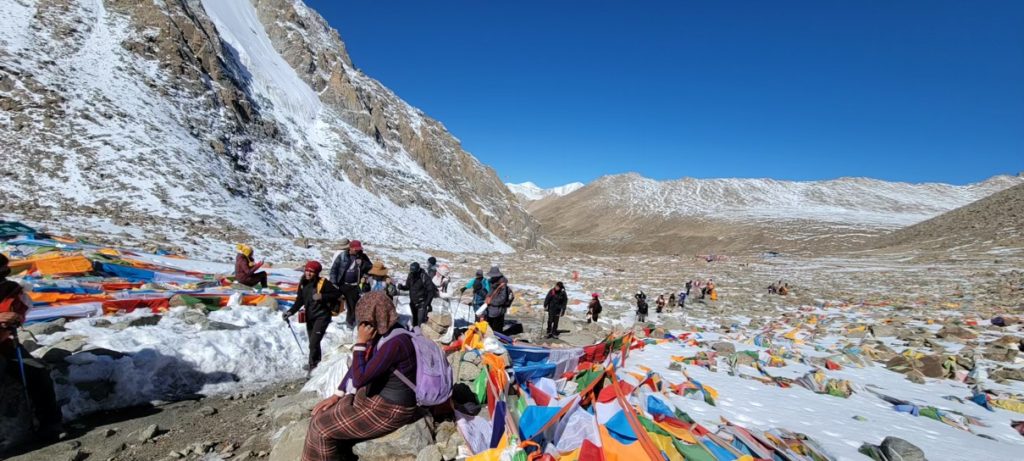Sacred prayer flags fluttering near Mount Kailash, a symbol of spiritual devotion-Mount Kailash Yatra