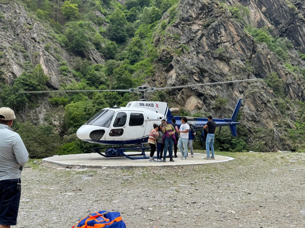 Kailash Helicopter Tour showing passengers enjoying aerial views of Mount Kailash, Lake Mansarovar, and the surrounding Himalayan peaks-Helicopter vs Overland Kailash Mansarovar