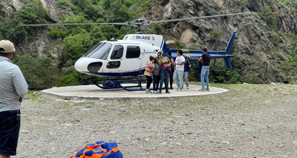 Kailash Helicopter Tour showing passengers enjoying aerial views of Mount Kailash, Lake Mansarovar, and the surrounding Himalayan peaks-Helicopter vs Overland Kailash Mansarovar-Kailash Mansarovar Yatra Cost