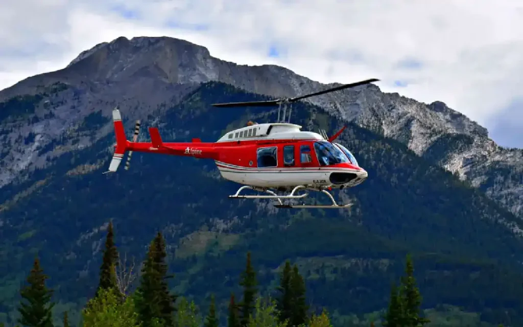 Kailash Helicopter Tour showing passengers enjoying aerial views of Mount Kailash, Lake Mansarovar, and the surrounding Himalayan peaks-Helicopter vs Overland Kailash Mansarovar-Mount Kailash Yatra