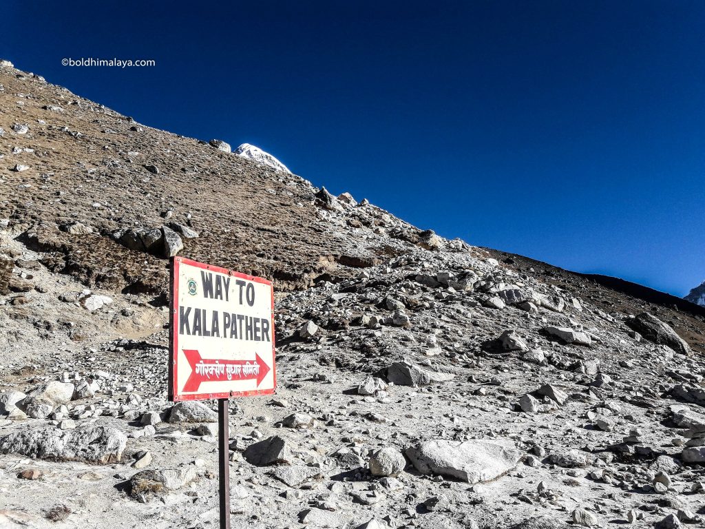 Way to Kala Patthar sign on the rocky mountain trail during the Everest Base Camp Trek in Spring in the Khumbu Region.