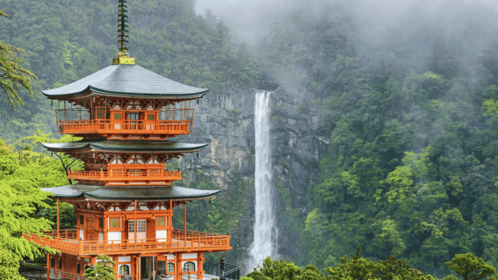Traditional pagoda near Kumano Nachi Taisha with Nachi waterfall in the Kumano Kodo region of Japan