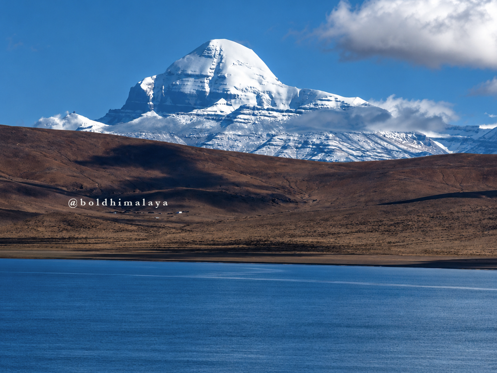 Mount Kailash stands prominently, behind Mansarovar lake, during Kailash Mansarovar Yatra on Full Moon.
