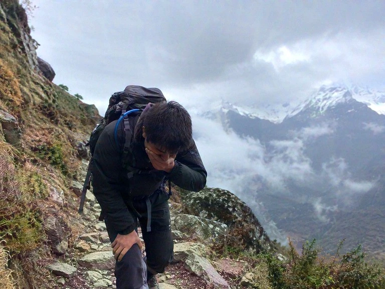 A person suffering from altitude sickness on Manaslu Circuit Trek.