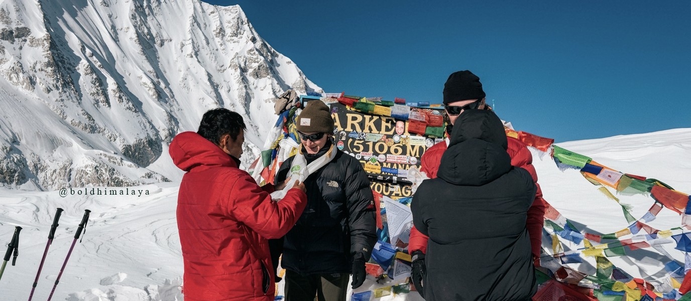 Trekkers celebrating their success at Larkya La Pass, during Manaslu Circuit trek 14 days
