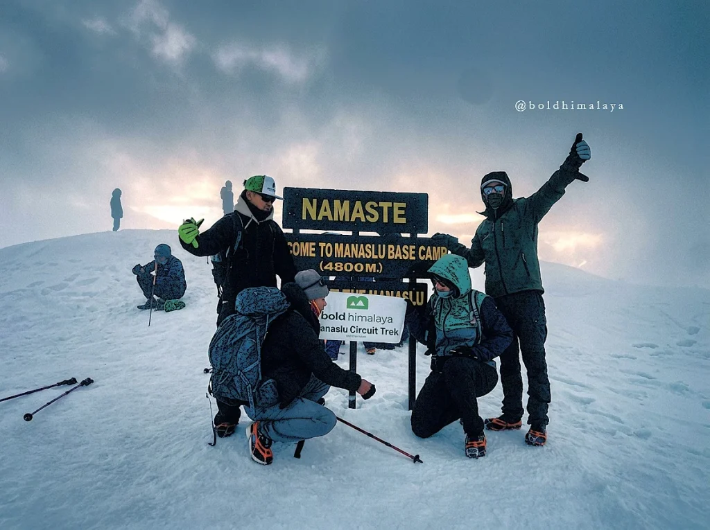 Trekkers taking photos with their guide during Manaslu Circuit Trek.