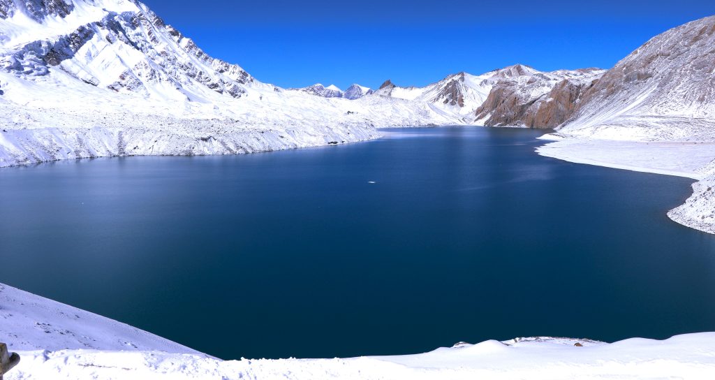 Exploring the stunning Tilicho Lake, one of the major attractions of Annapurna Circuit Trek.